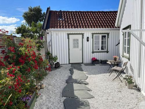 Larvik Apartamento | Idyllisk lite anneks med enestående uteplass
