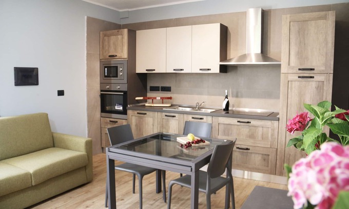 Aritzo Apartamento | Apartamento independiente Cherry en casa de vacaciones con jardín y barbacoa.