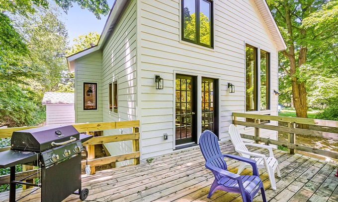 Benzonia Casa | Inviting home in great location with large deck, firepit, gas grill & streaming