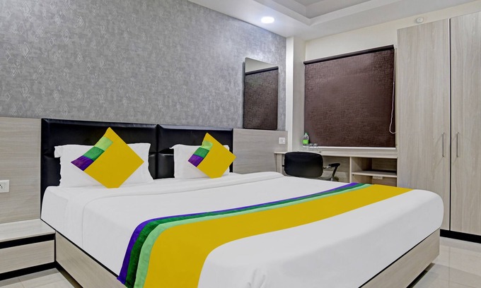 Rau Hotel | Itsy By Treebo - Lotus