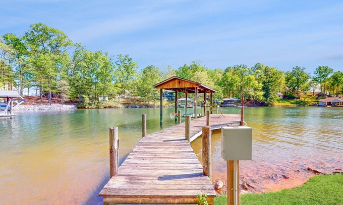 Huddleston Cabaña | Jewelbox Cottage - Lakefront home with fireplace, private dock, canoe & SUPs