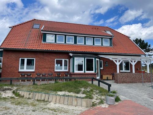 Spiekeroog Cabina | Jugendbildungsstätte Quellerdünen Gästehaus 1