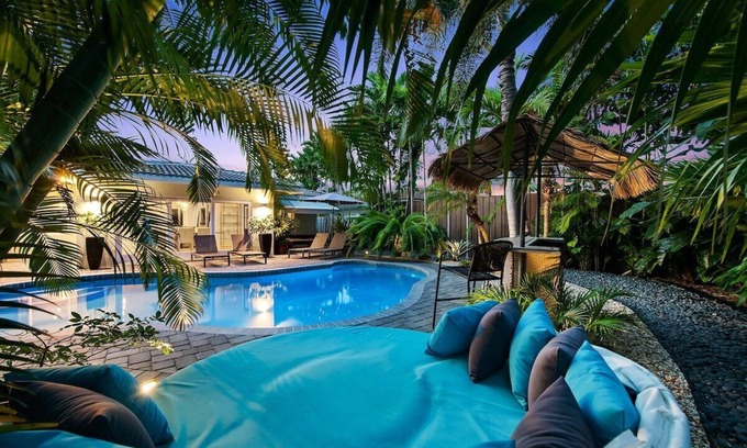 Central Fort Lauderdale Casa | Just 10min to downtown Ft. Lauderdale & beach, this modern home offers everything a group could want for an upscale relaxing getaway. Unwind in the very private and peaceful backyard oasis, featuring a heated ($) pool, 6-person hot tub & fire pit.