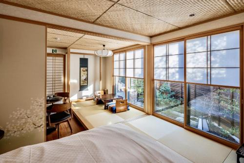 Sakyo Ward Casa | Kamogawa House