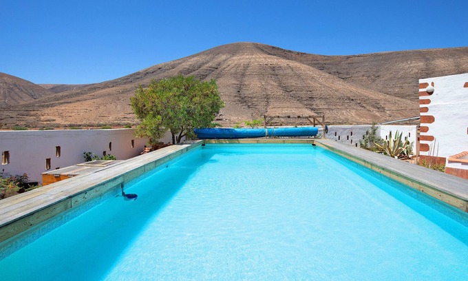Guisguey Apartamento | Casa de vacaciones Kikiki House Apartamento Rosso con vistas a la montaña, piscina y Wi-Fi