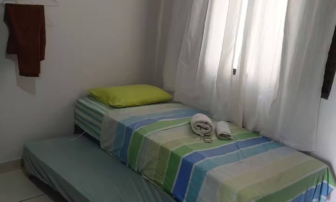 Maringa Apartamento | Kit net 07 Camila space 1 double bed 2 singles.