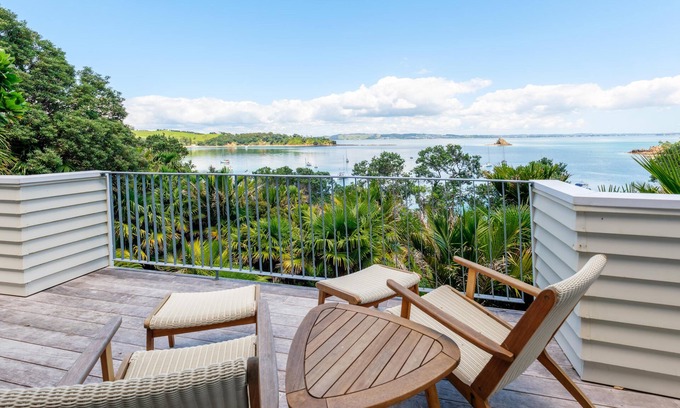 Omiha Casa | Koi Waiheke - Koi Waiheke is a stunning luxury holiday home in Omiha, Waiheke Island. With 4 bedrooms; 4 bathrooms; a large entertainer’s kitchen; spectacular ocean views; a private mooring; and a boat shed offering direct access to the ocean. This i