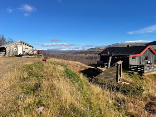 Dovre Casa | Koselig hytte med uthus på vakre Dovrefjell