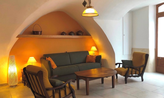Montpeyroux Casa | "la maison de Marie" 17th century village house stone arches courtyard + terrace