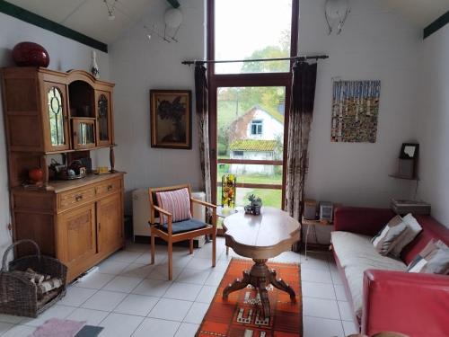 Gouvy Casa | La maison sous les arbres