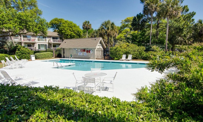 Isle of Palms Villa | Condominio con vista a la laguna con balcones privados, piscina compartida y baloncesto - acceso a la playa