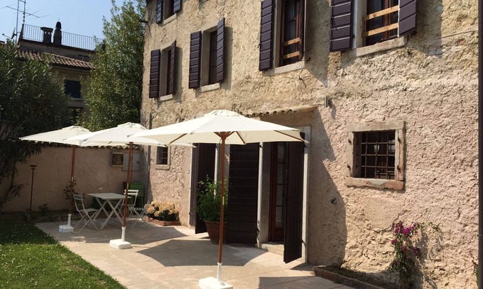 Garda Casa | Villa con vista al lago rodeada de vegetación