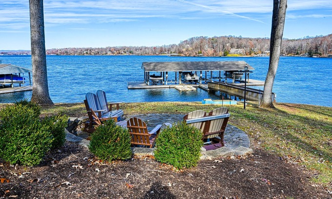 North Shore Casa | Lakefront, dog-friendly townhome with dock, boat slip, sunrise views & decks