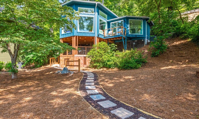Lake Lure Cabaña | Lakefront dream stay with dock, three kayaks, paddleboard, & grill - near golf