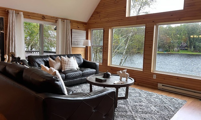 Pocono Lake Casa | Lakefront - Hot Tub, AC, 7 Paddleboards, Canoe, Kayak, Golf Car, Fire Pit, Boat