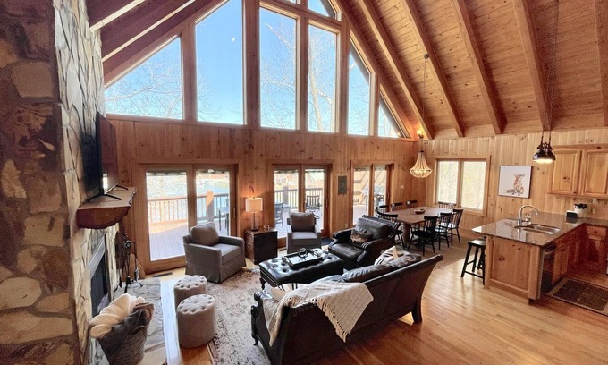 Six Mile Casa | Lakefront house with multiple outdoor areas, fire pit, dock and two kayaks