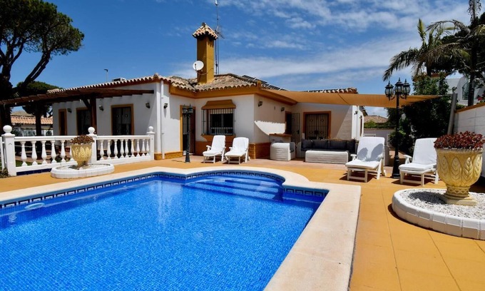 Poblado Sancti Petri Villa | Villa Arrecife para 8 personas con gran zona exterior ajardinada piscina vallada