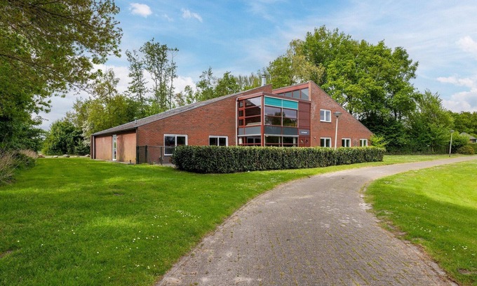 Gasselternijveen Casa | Casa grupal con chimenea cerca del agua