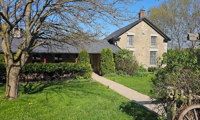 Meaford Otro | Large stone house with hot tub pond, secluded acerage, up to three families