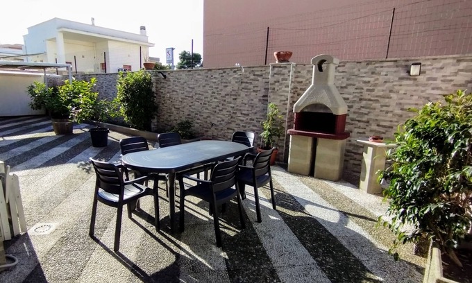 Lizzano Apartamento | Large two-room apartment with garden and outdoor barbecue 7km from the sea