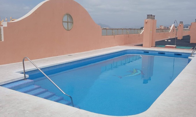 Carretera de Cadiz Casa | LAS CANDELAS - Bonito apartamento con piscina compartida y cerca de la playa.