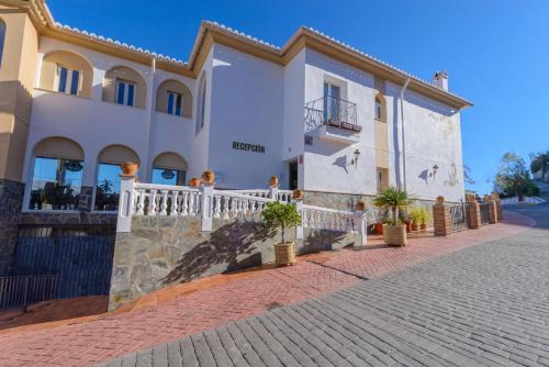 Vinuela Casa | Las Orquídeas