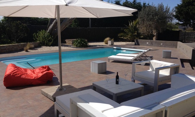 Tregunc Villa | PROMO! 9-19 .07 Villa contemporánea con vistas al mar y piscina climatizada