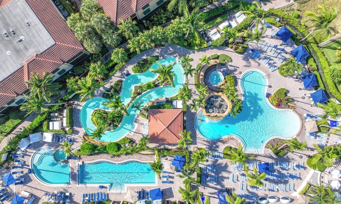 Naples Cabaña | Lazy River, 4 Pools, 5th Ave Resort, Your Personal Oasis, Walk to 5th Ave shops