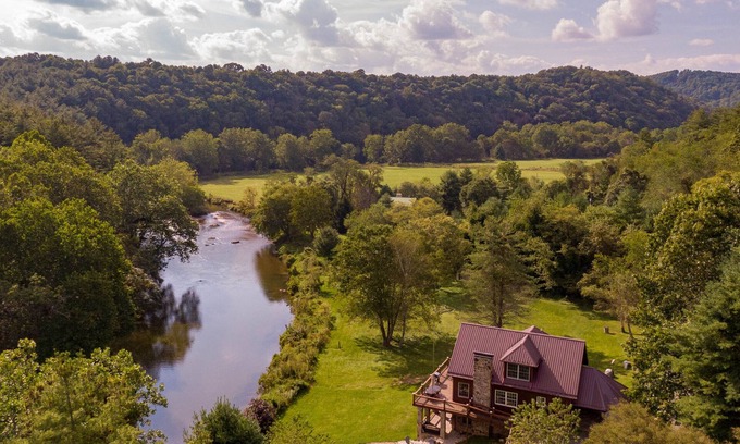 Crumpler Casa | Lazy River Lodge - Riverfront home with fire pit, hot tub!