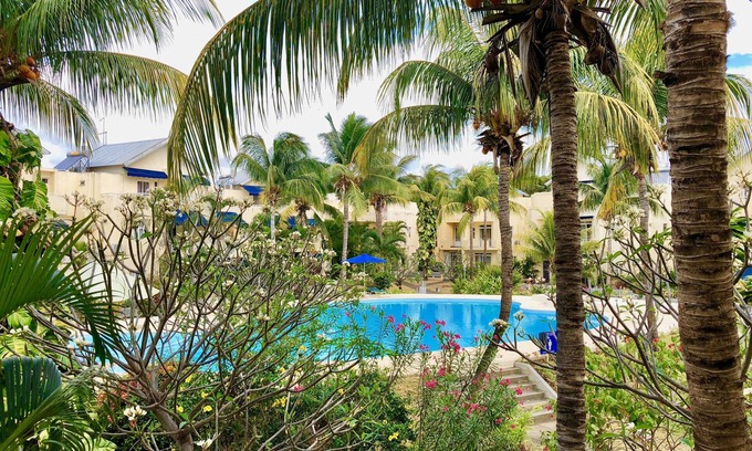 Flic-en-Flac Casa | Le Tamier - Duplex junto al mar y piscina