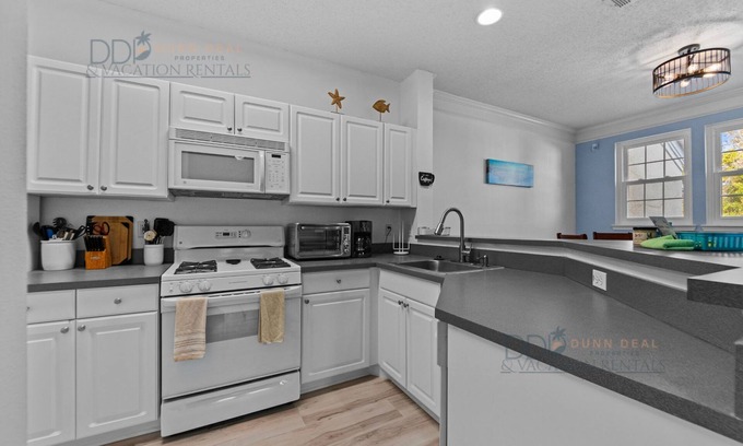 Gulfport Villa | Legacy Villa #1004 "Sunshine Vibes" Just a few minutes walk to the beach.