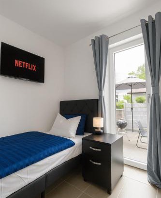 Straubing Apartamento | LETA Homes - Komfortables Gästehaus - eigene Parkplätze & Traumterrasse