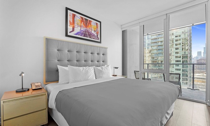 Near North Side Hotel | Level Old Town - Two Bedroom Suite with full kitchen, living room, and laundry