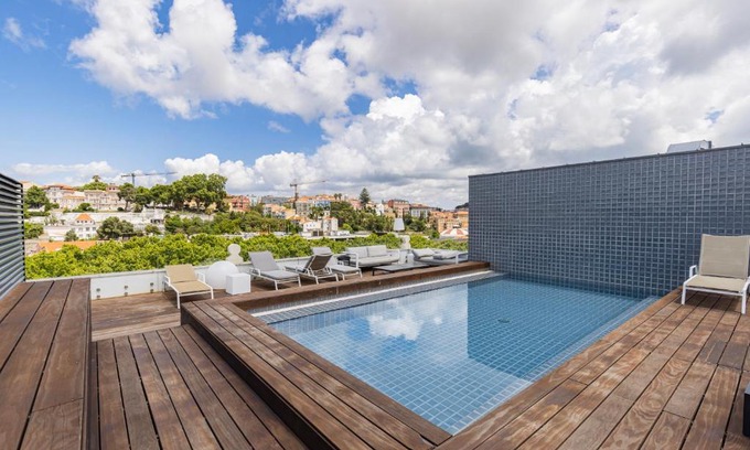 Sao Jose Apartamento | Liberdade Elegance W/Rooftop Pool by LovelyStay