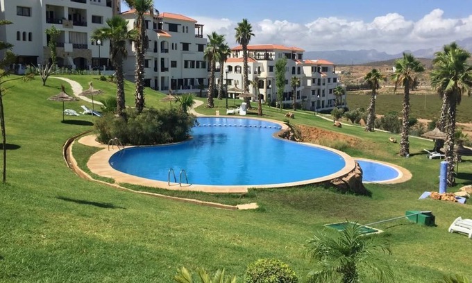 Cabo Negro Apartamento | Lilac's garden Vue piscine
