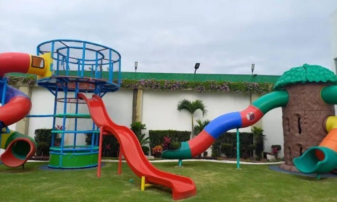 Zama Villa | Lively villa with pool, waterfall, and slide