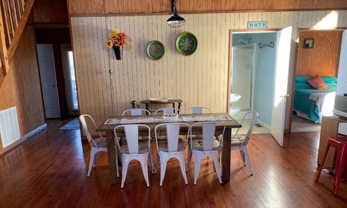 Calico Rock Casa | Lockie Lodge, rustic A frame style home with open concept.