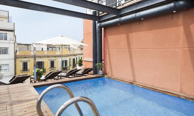 el Fort Pienc Apartamento | Loft en el Arco del Triunfo de Barcelona con terraza, piscina y Wi-Fi gratis