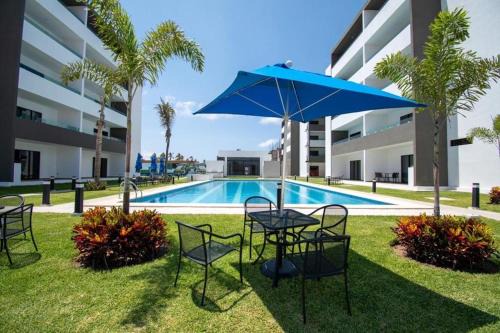 Villa Marina Apartamento | Loft de lujo con 9 albercas y vistas al campo de golf