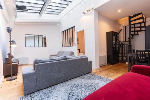 Quartier de la Roquette Apartamento | Loft House 3 BR Bastille, Marais AC by LCC Agency