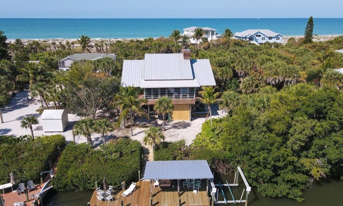 Palm Island Casa | Loggerhead Landing: Beach, swim spa and dock: This lodge on the beach has it all!