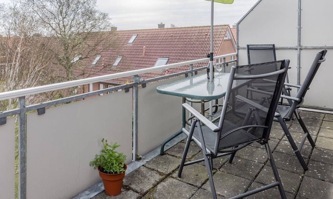 Harlesiel Apartamento | Look far, farther, farthest: The upper floor apartment with its approx. 60 sqm