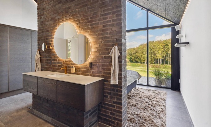 Hejlsminde Strand Casa | Look forward to a beautiful sea view in this attractive vacation home with outdoor wellness.