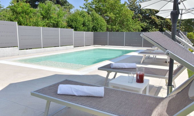 Padenghe sul Garda Apartamento | Lotus | Garda Bloom Holiday Apartments at Lake Garda