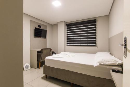 Guarapuava Apartamento | Lou Suítes - Suíte 05 - Essência do Silêncio