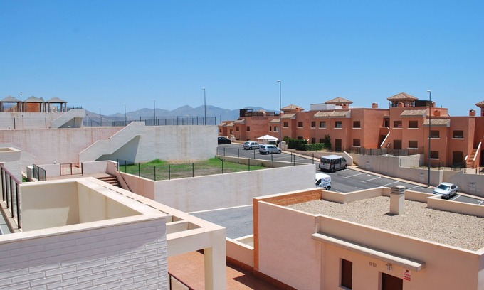 Los Puertos Apartamento | Precioso apartamento de 2 dormitorios con excelentes vistas al mar. piscina compartida y terraza de buen tamaño