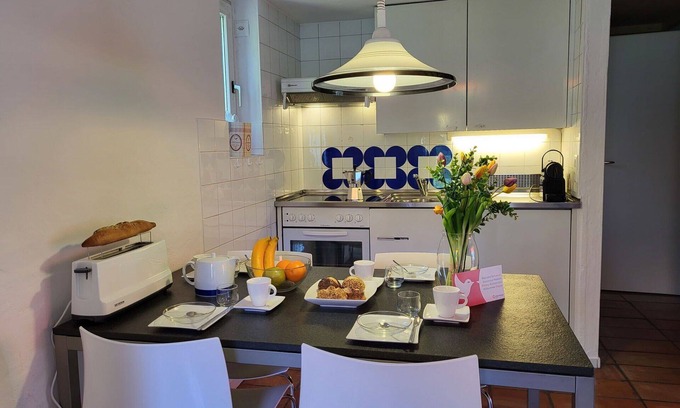 Capriasca Apartamento | Hermoso apartamento para 5 personas con WIFI, piscina, TV, patio, mascotas permitida y aparcamiento