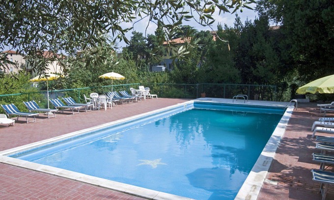 Paciano Apartamento | Hermoso apartamento para 7 personas con WIFI, piscina, TV, patio, mascotas permitida y aparcamiento