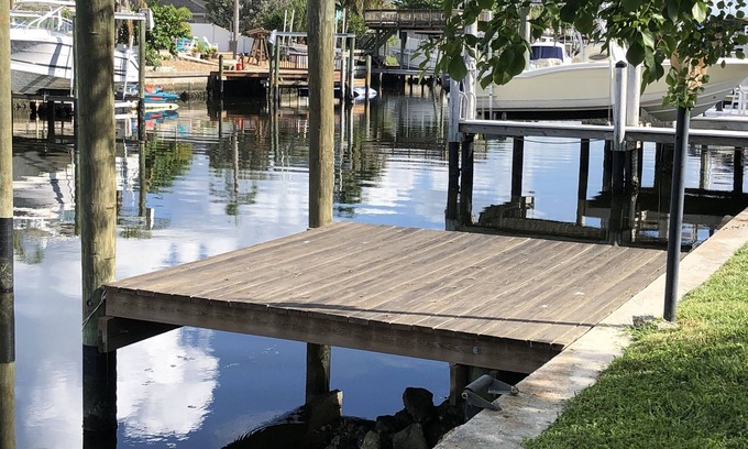 Bal Harbour Casa | Lovely House on the canal with private dock, large fenced yard & pet friendly