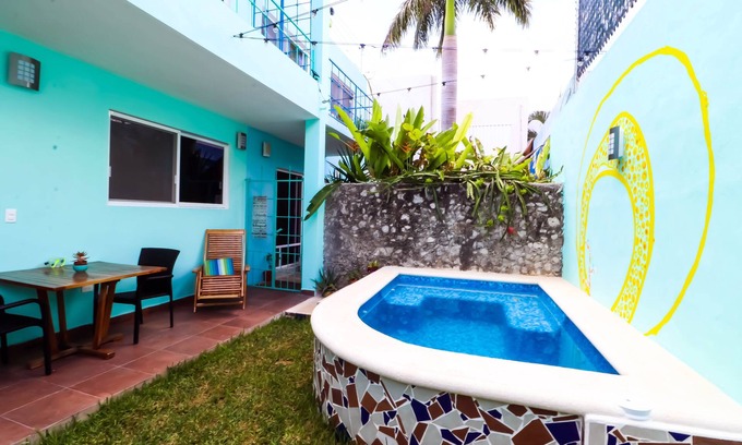 Colonia Andres Apartamento | Luna - Alexa art loft w extras - bicycles & snorkel gear. shared pool & grill